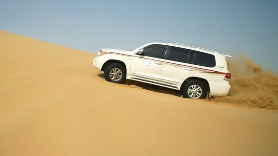 Doha: safari sulle dune, giro in cammello e sandboarding con trasferimento