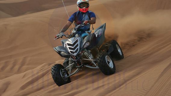 Dune Bashing with Quad Bike and Sand Boarding from Dubai