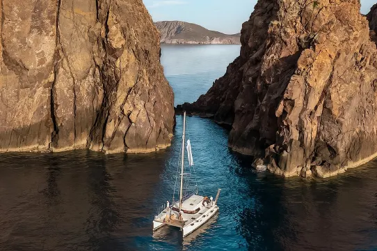 Catamaran Full-Day of Milos and Poliegos With Lunch & BBQ