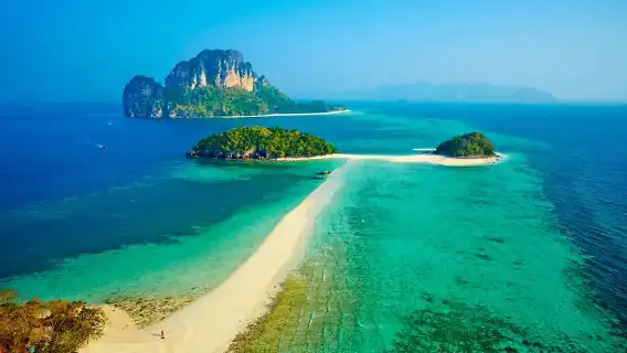 Krabi magical 4-island speedboating tour with pickup service, lunch, island hopping, snorkeling, and Railay Beach