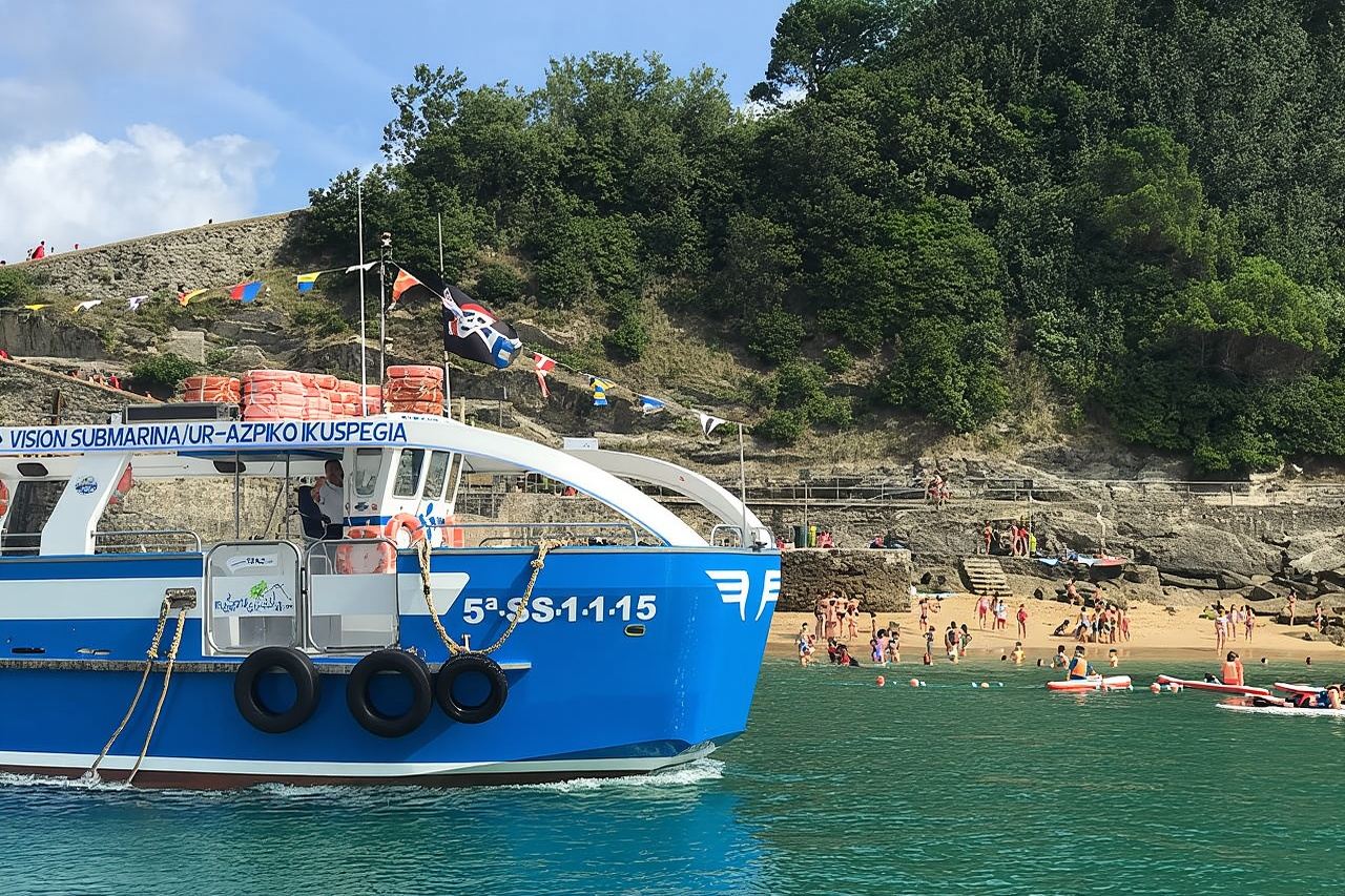 Boat by the Bay and Santa Clara Island in Donostia San Sebastian