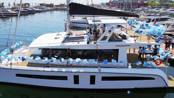 [Dalian Yacht] Private 68ft Catamaran Charter in Dalian Donggang + Fruits & Drinks + Yacht Driving Experience + Seagull Feeding + Yacht Slide Pool + Water Mat + Paddleboard