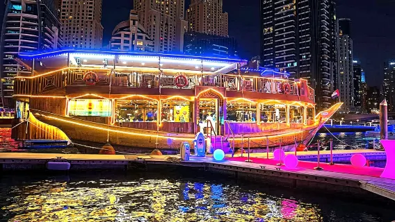 Dubai Marina Dinner Dhow Cruise with International Buffet, Live Music & Tanoura Show