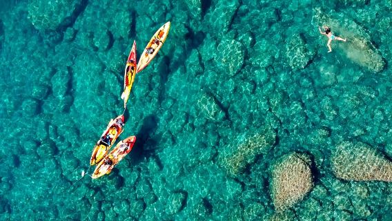 Costa Brava Day Adventure: Kayak, Snorkel & Cliff Jump with Lunch