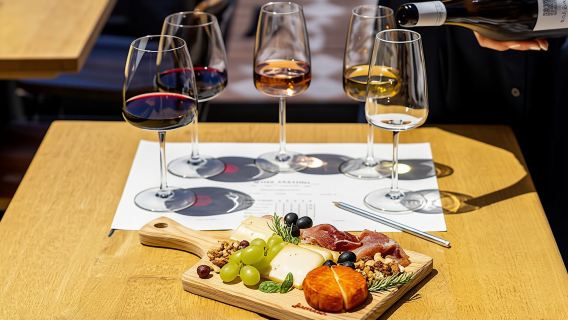 Porto Wine Tasting Experience with Portuguese Cheese and Ham Plate
