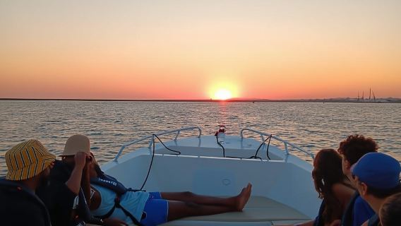 Faro: Paseo en barco de 1 hora por la Ría Formosa al atardecer