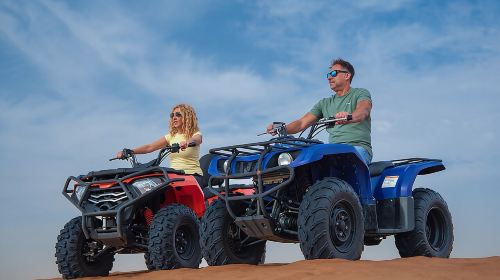 Premium Dubai Red Dunes Quad Bike Tour, Sandboard, Camel & BBQ  Day Tours 6