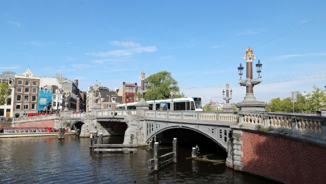 Canal + Royal Palace + Madame Tussauds + Red Light District Amsterdam Centrum + Blauwbrug Day Tour