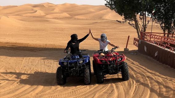 Dubai: Unique SUNSET Quad Bike Red Dunes Safari