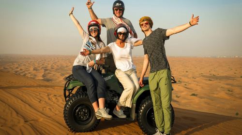 Red Dunes Safari by Quad Bike, Camel Ride, Sandboarding and BBQ at Al Khayma Camp Day Tours 9