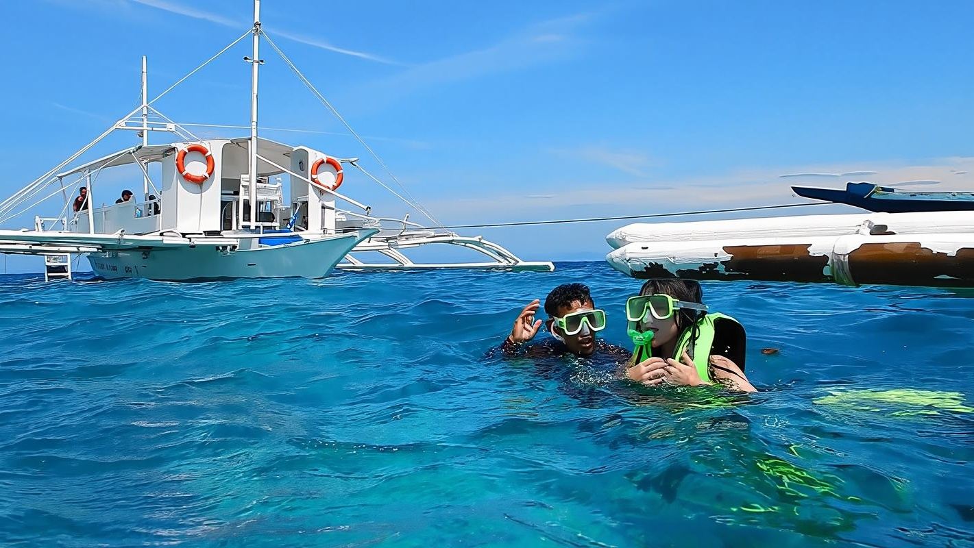 Tour privato di un giorno a Cebu Mactan nelle Filippine: Isola di Caohagan + Snorkeling + Picnic + Trasferimento
