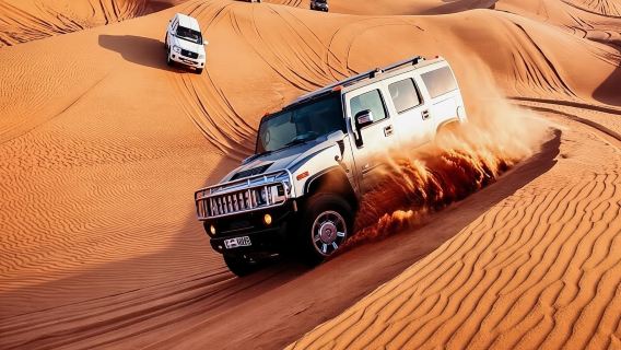 Premium Desert Safari with BBQ Dinner,Belly Dance,Camel Riding & Sand Boarding
