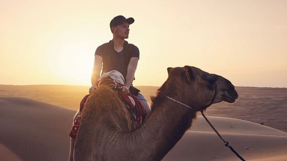 Morning Desert Safari with Camel Ride and Sandboarding