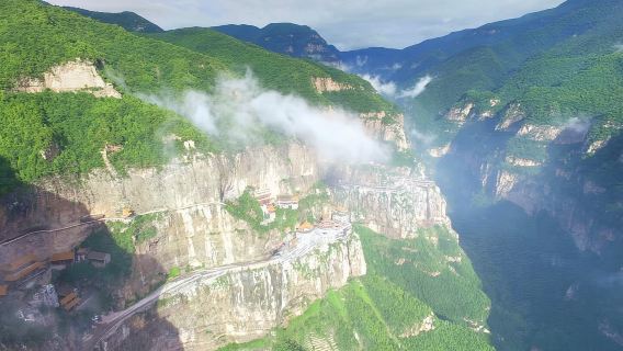 Depart from Pingyao to visit Wang Family Courtyard, Zishou Temple, Zhangbi Ancient Fort, and Mianshan