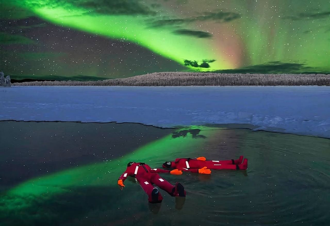 Northern Lights Floating Experience in Rovaniemi, Finland / Classic Activity / Includes Thermal Floating Suit / Hot Tea