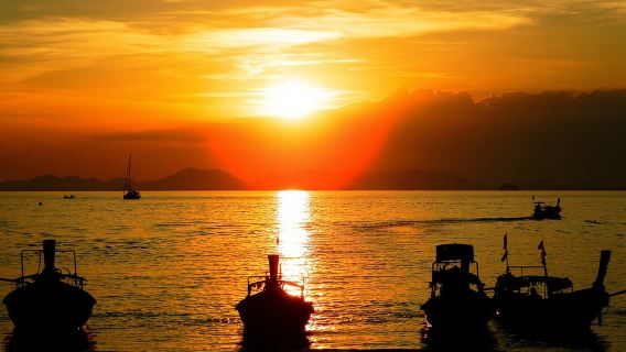 Excursión al atardecer a 7 islas con cena buffet y snorkel nocturno