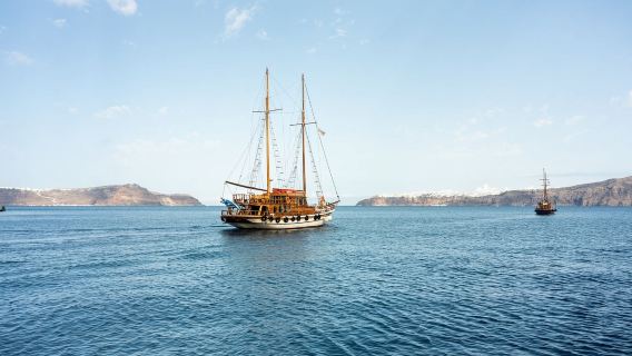 Santorini volcano island cruise + Oia sunset tour with transfer and guide included