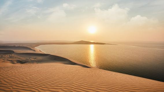 Qatar: Sunset Desert Safari with Camel Ride & Sandboarding