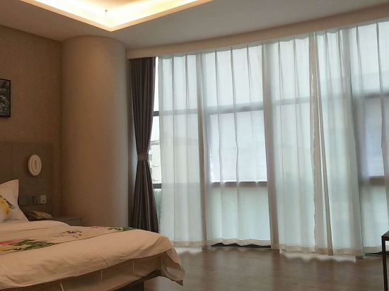 Shanyehong Hotel Room Type - Yijing Double Bed Room (Goose Down Deep Sleep Pillow + Giant Projection TV + Coffee Table Sofa) Shanyehong Hotel Room Type - Yijing Double Bed Room (Goose Down Deep Sleep Pillow + Giant Projection TV + Coffee Table Sofa)