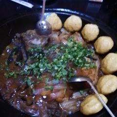 Stewed river fish in an iron pan User Photo