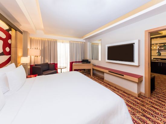 Radisson Blu Hotel Doha - Tap to explore photos