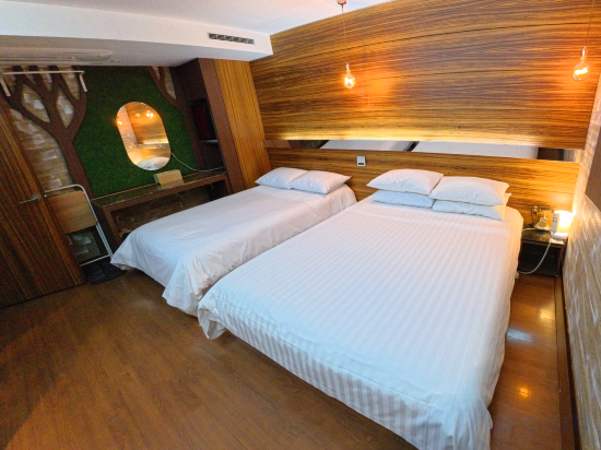 Friendly DH Naissance Hotel by Mindrum Group - Tap to explore photos