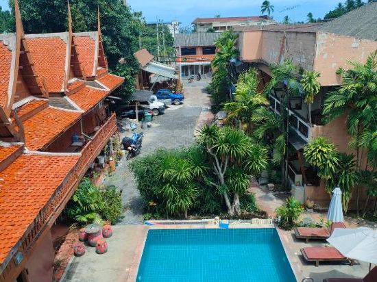Grand Thai House Resort - Tap to explore photos