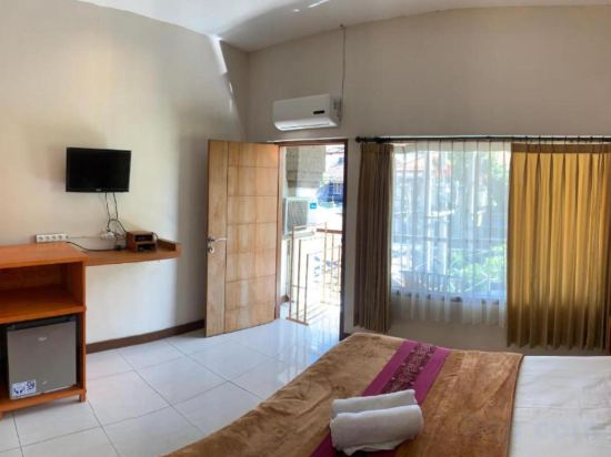 Kuta Suci Beach Hotel - Tap to explore photos