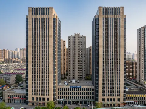 Elong Wanguo Hotel (Jinan Railway Station K88 Famous Spring Plaza)