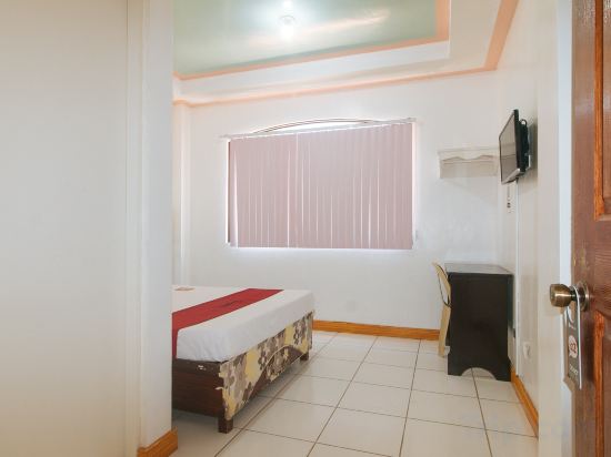 OYO 426 Coco Grove Tourist Inn Room Type - RedDoorz Standard Room