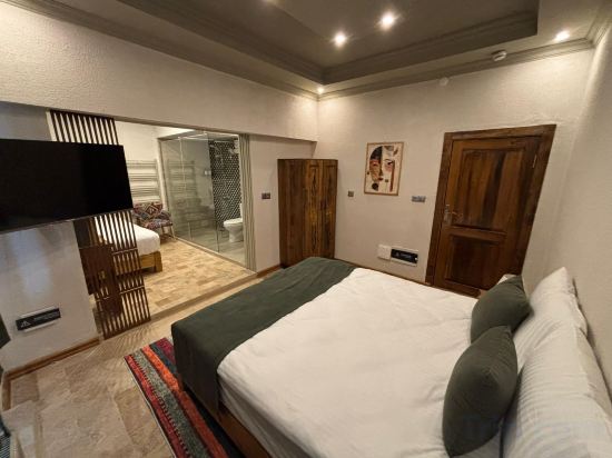 Grand Elite Cave Suites - Tap to explore photos