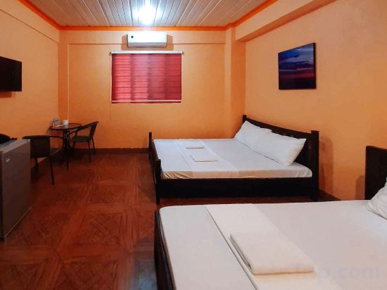 RedDoorz @ Johsons Pension House Butuan City - Tap to explore photos