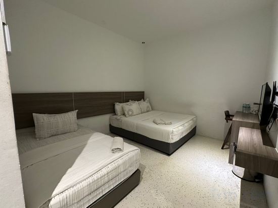 W F MOTEL Room Type - Deluxe Triple Room