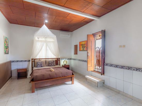 Artha Dewata Home Stay - Tap to explore photos