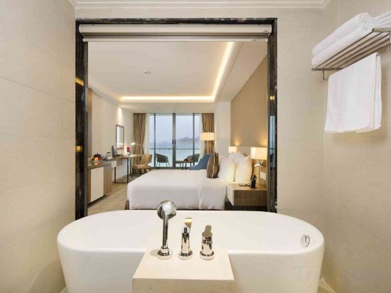 Comodo Nha Trang Hotel - Tap to explore photos