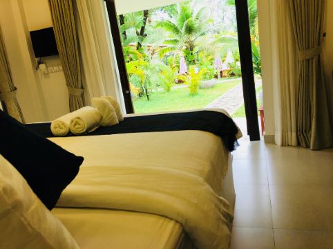 Sahaa Beach Resort Room Type - Deluxe Double Bungalow Garden View Sahaa Beach Resort Room Type - Deluxe Double Bungalow Garden View