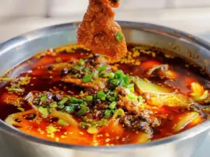 WU MING MAO CAI