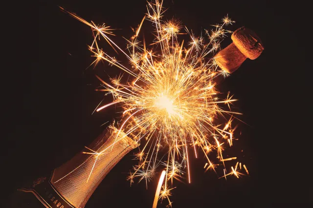 Champaign bottle and cork firework with sparklers