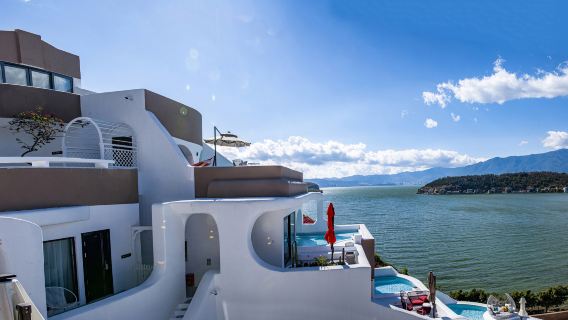 Private guided one-day tour to Erhai, Xizhou, Shuanglang, Taise, Xiao Putuo, and Ideal State from Dali