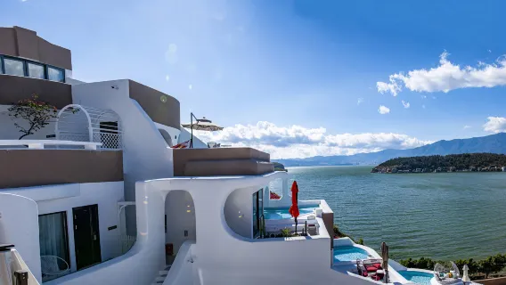 Private guided one-day tour to Erhai, Xizhou, Shuanglang, Taise, Xiao Putuo, and Ideal State from Dali