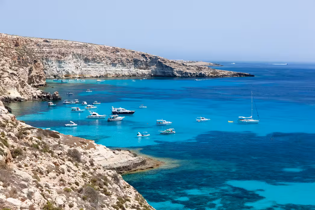 Vuelos ${{cityDName}} Lampedusa