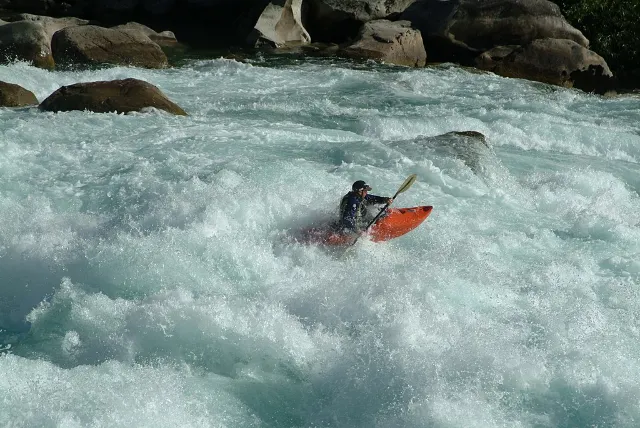 Kayaker Jon Clark in Terminator Rapid on the Futaleufu River, Chile. Photo: Warren Williams