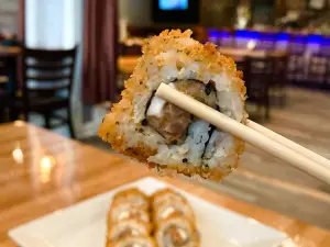 Saki Tumi Grill & Sushi Bar