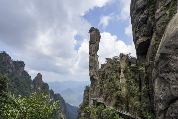 Giant Python Emerging from the Mountain