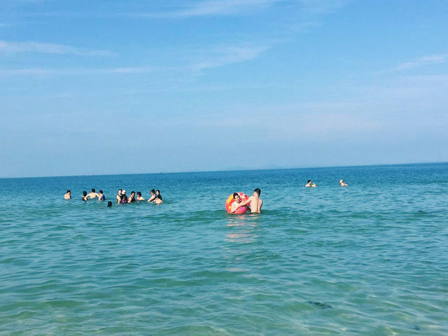 Beach, blue sky, clear waters