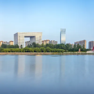 Отели рядом с достопримечательностью «SIAS International University Gymnasium， Zhengzhou University»