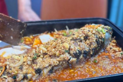 一家館子紙包魚