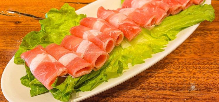 苗彝侗寨酸汤牛肉火锅店