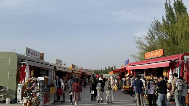 zhang ye qi cai dan xia lv you jing qu bei men shang ye zhong xin