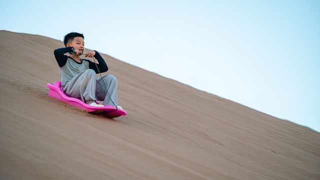 Sandboarding at Qinghai Lake